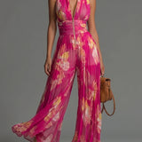 Cayetana | Fuchsia chiffon jumpsuit met bloemenprint en wijde pijpen