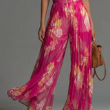 Cayetana | Fuchsia chiffon jumpsuit met bloemenprint en wijde pijpen