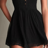Melisa Vestido Mini Negro Plisado con Detalles de Encaje