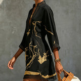 Alissa | Elegante lange jurk met gouden marmerprint