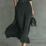 Geplooide jurk met reverskraag en hoge taille voor elegante look