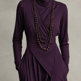 Maxi jurk met hoge hals en bohemien elegantie in paars