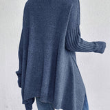Oversized coltrui met zachte knit en verlengde achterkant