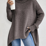 Oversized coltrui met zachte knit en verlengde achterkant