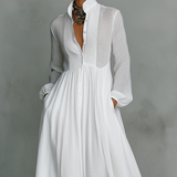 Maxi jurk met knoopsluiting en elegante zwierige pasvorm