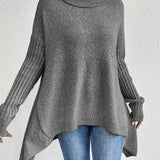 Oversized coltrui met zachte knit en verlengde achterkant