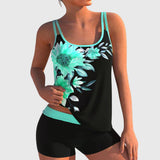 Flor – Bloemige tankini met short, effect platte buik