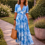 Ione | Mouwloze midi-jurk met bloemen en V-hals