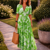 Ione | Mouwloze midi-jurk met bloemen en V-hals