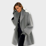 Elegante jas met winddicht materiaal en verstevigde afwerking