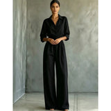 Elena Mono Elegante con Cintura Ajustable y Pantalón Ancho