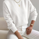 Coltrui in zachte knit met minimalistische elegantie