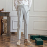 Casual broek met plooien en verstelbare zijverstellers
