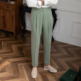 Casual broek met plooien en elegante zijknopsluiting